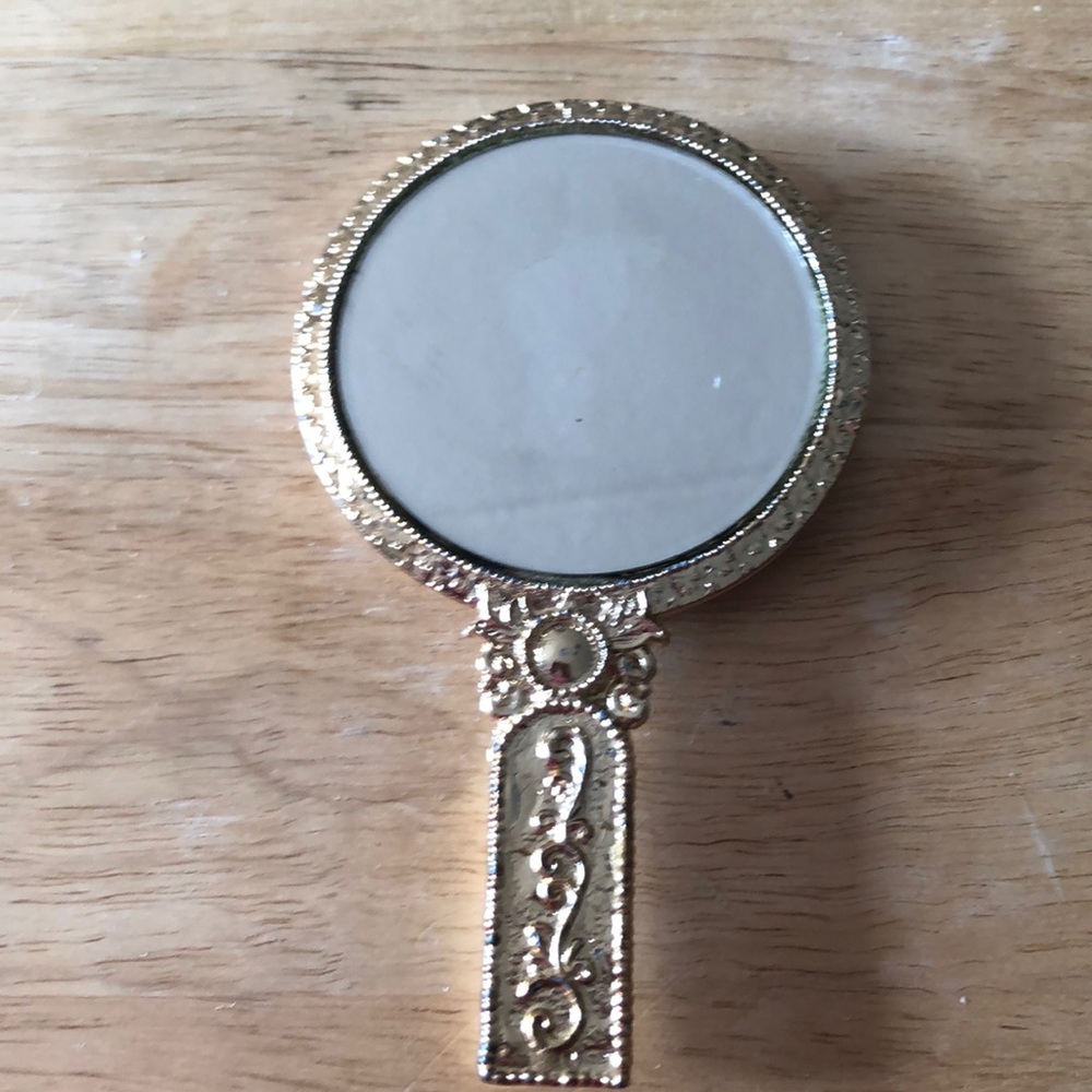 3 hand held mirrors